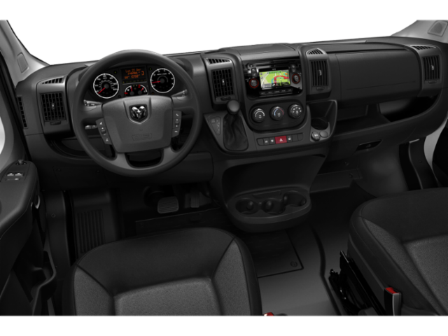 Vehicle interior dashboard showing steering wheel, instrument cluster