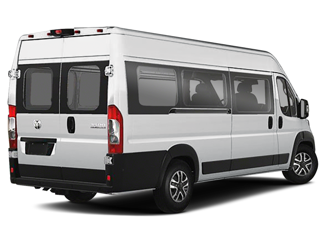 Rear three-quarter view of a white passenger van with rear windows