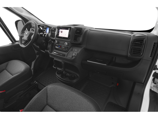Wide interior view of van cabin showing dashboard, steering wheel