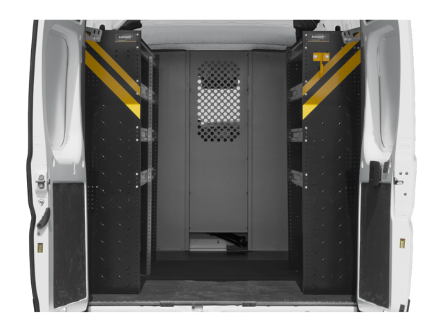 Rear cargo area outfitted with shelving units and storage racks along both sides