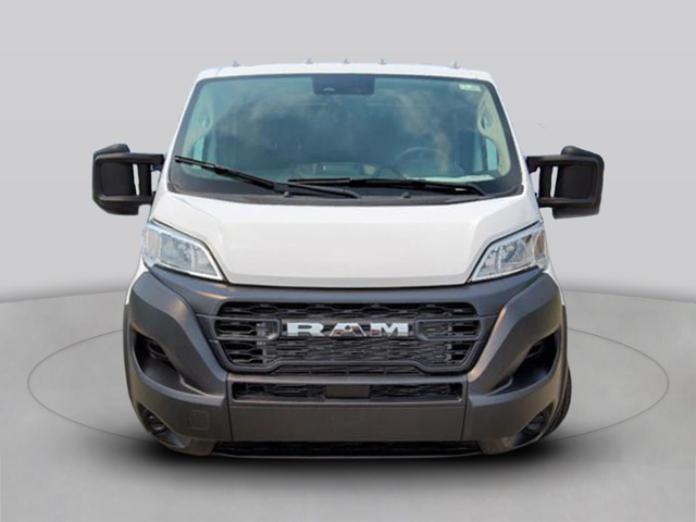 Front view of a white RAM chassis cab truck with large grille