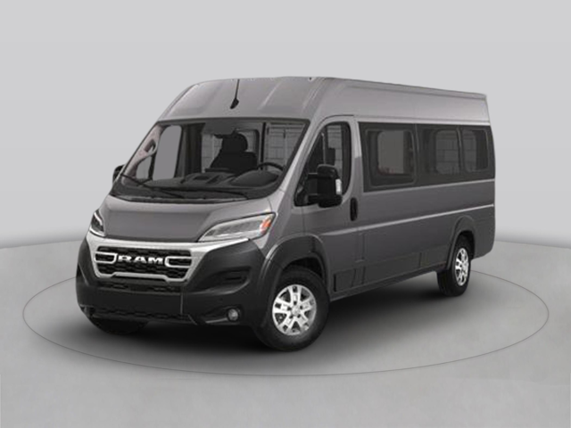 Side profile of a dark blue passenger van with multiple windows