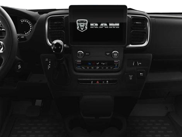 Driver-side interior view of a van with steering wheel, dashboard