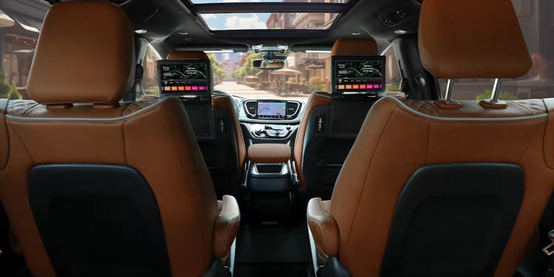 Interior view of a minivan from the back showing two rows of seats