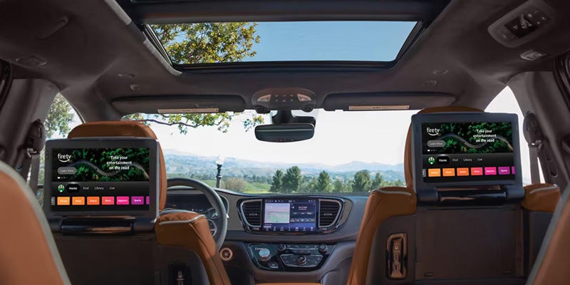 Interior rear view of a minivan showing two front seats