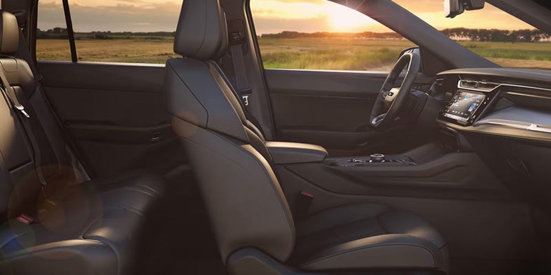 Front interior of an SUV showing passenger seat, dashboard, center console