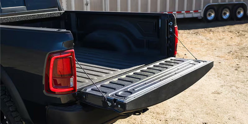 Open tailgate of a pickup truck showing an empty truck bed